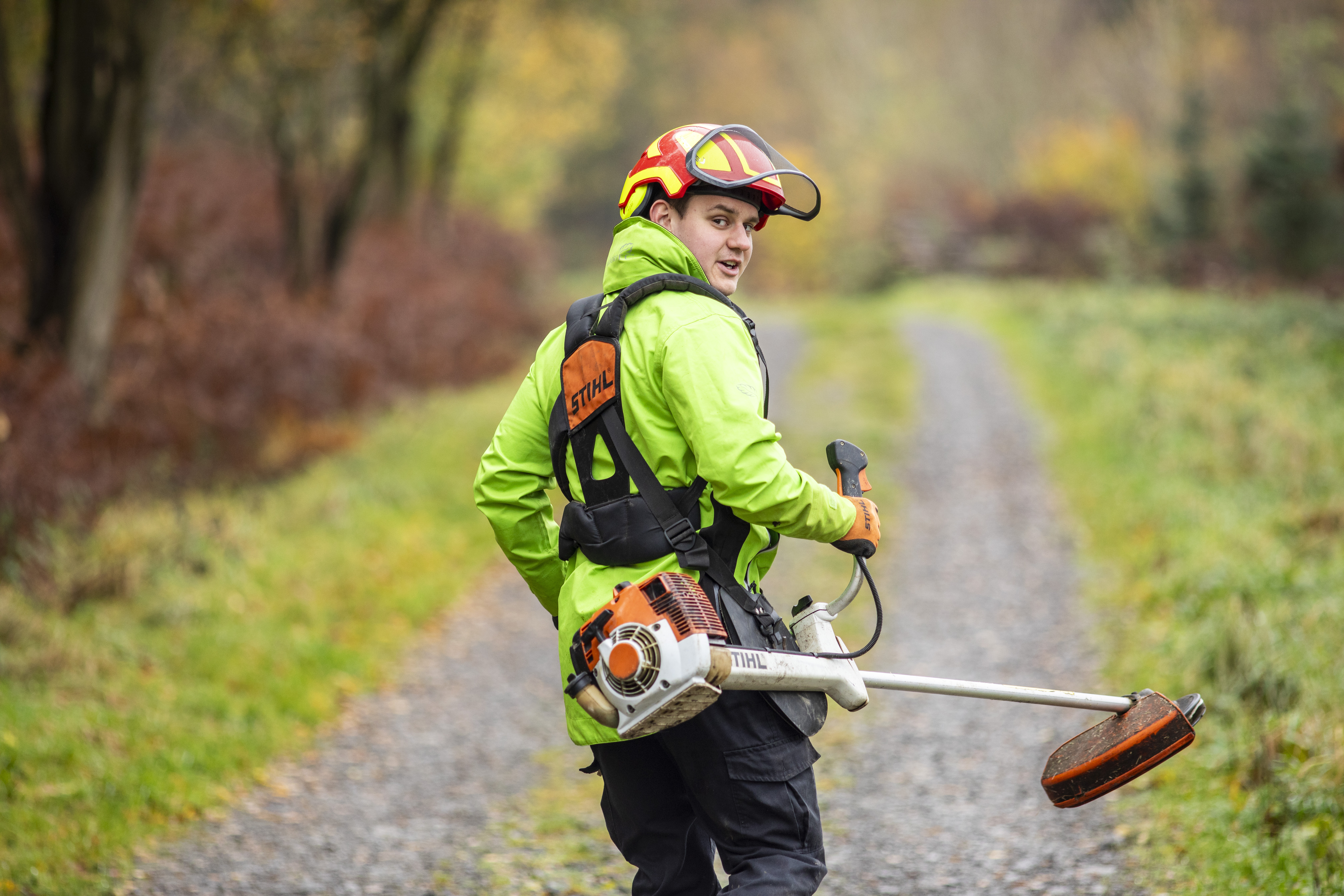 Apprentice working outdoors